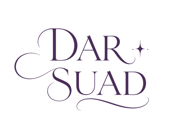 Logo of Dar Suad with decorative elements on a white background